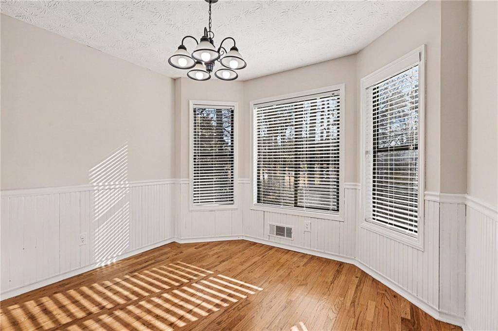 2711 Old Coach Road Duluth, GA 30096 - Photo 8 of 33 a view of an empty room with a window