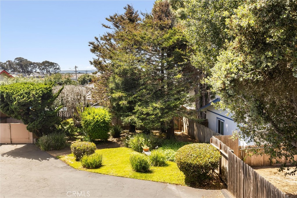 239 F Surf Street Morro Bay, CA 93442 - Photo 19 of 25 a view of a house with a yard