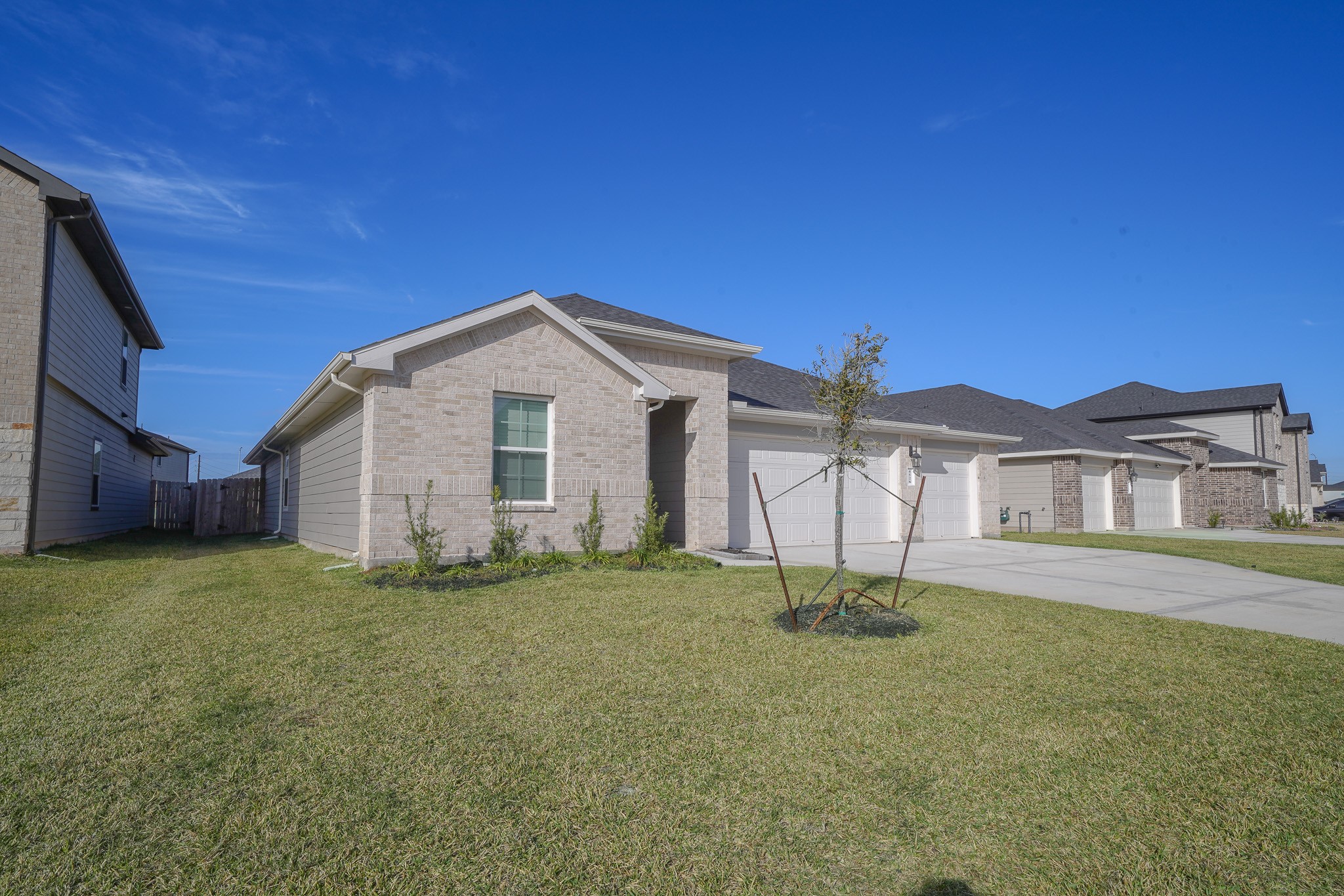 4526 Waving Willow Way Rosenberg, TX 77469 - Photo 2 of 40 a front view of a house with a yard