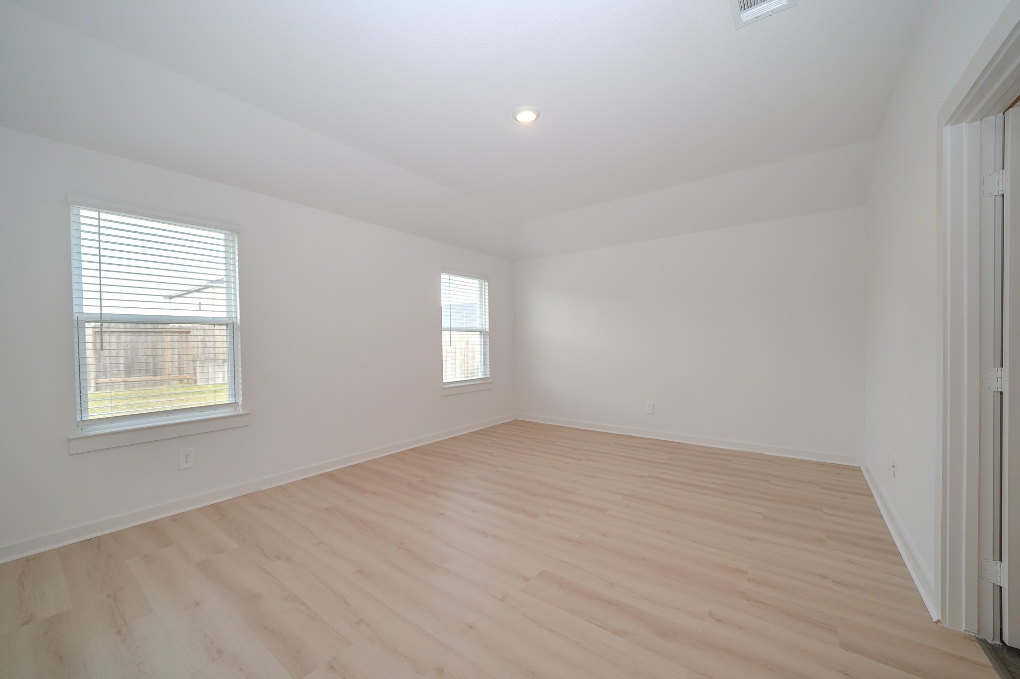 4526 Waving Willow Way Rosenberg, TX 77469 - Photo 26 of 40 an empty room with windows