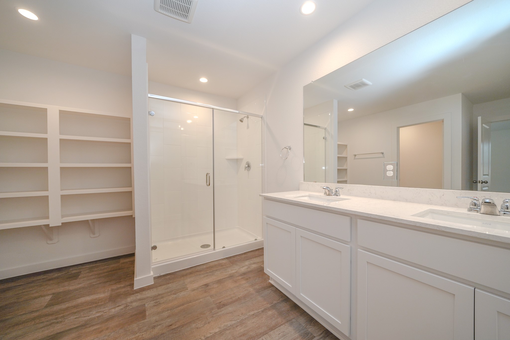 4526 Waving Willow Way Rosenberg, TX 77469 - Photo 29 of 40 a bathroom with a double vanity sink and a mirror