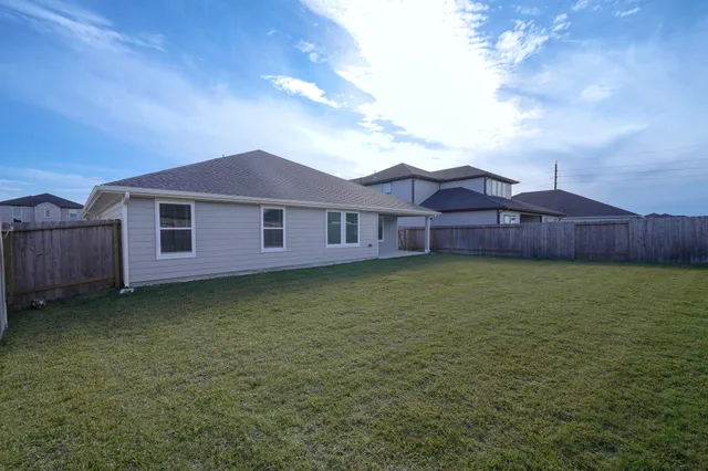 a view of a house with a garden