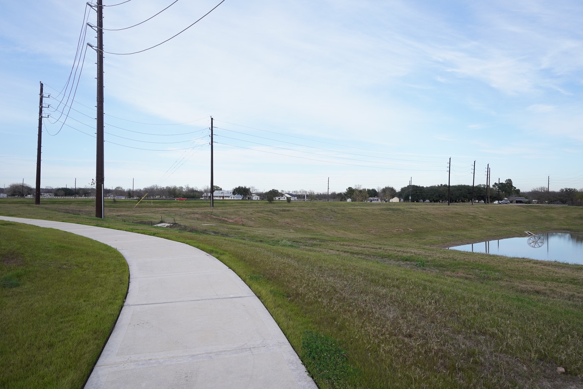 4526 Waving Willow Way Rosenberg, TX 77469 - Photo 37 of 40 a view of a ocean with a big yard and a large trees