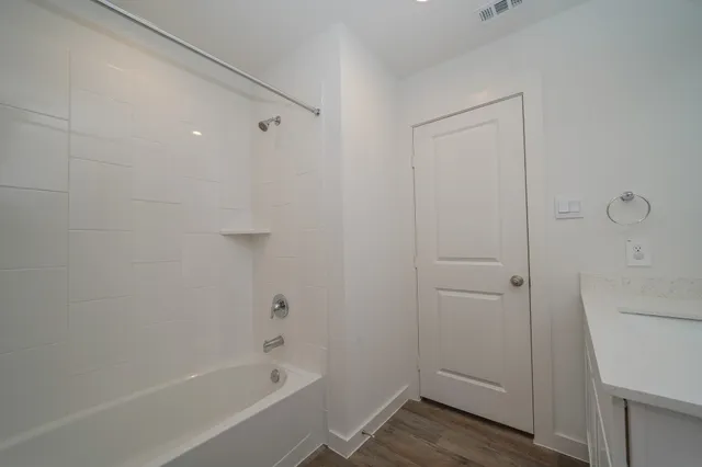 a bathroom with a bathtub