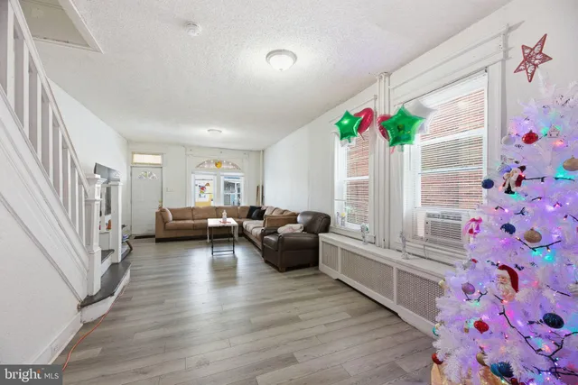 a living room with furniture and a couch