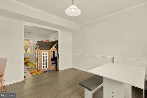 a view of a storage & utility room with two washing machine