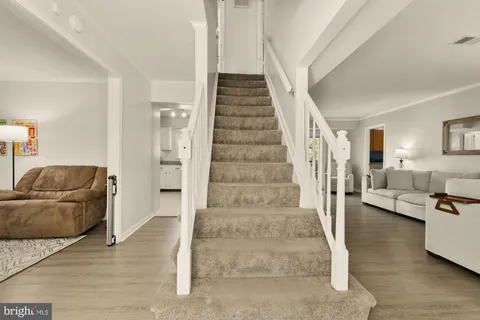 a living room with furniture and a couch