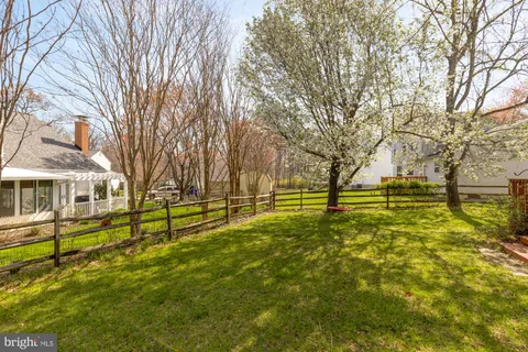 a view of a backyard with a garden