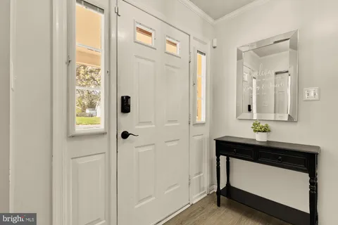 a bathroom with a sink a mirror and a shower