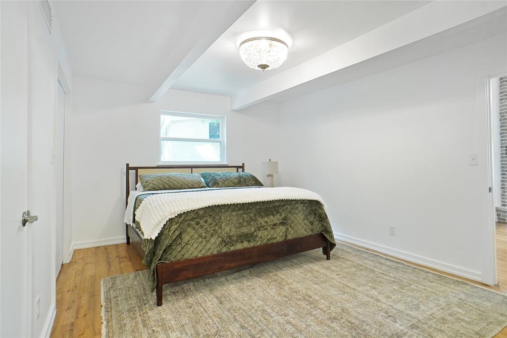 2147 Chaparral Gainesville, TX 76240 - Photo 16 of 40 a bedroom with a bed and window