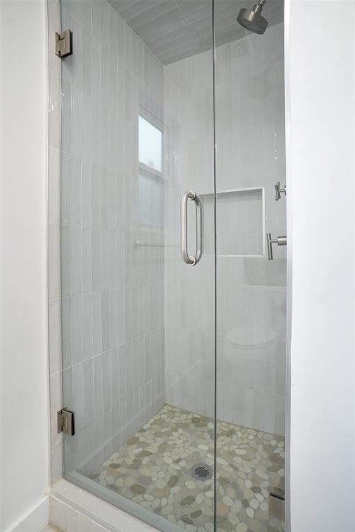 2147 Chaparral Gainesville, TX 76240 - Photo 18 of 40 a bathroom with a shower