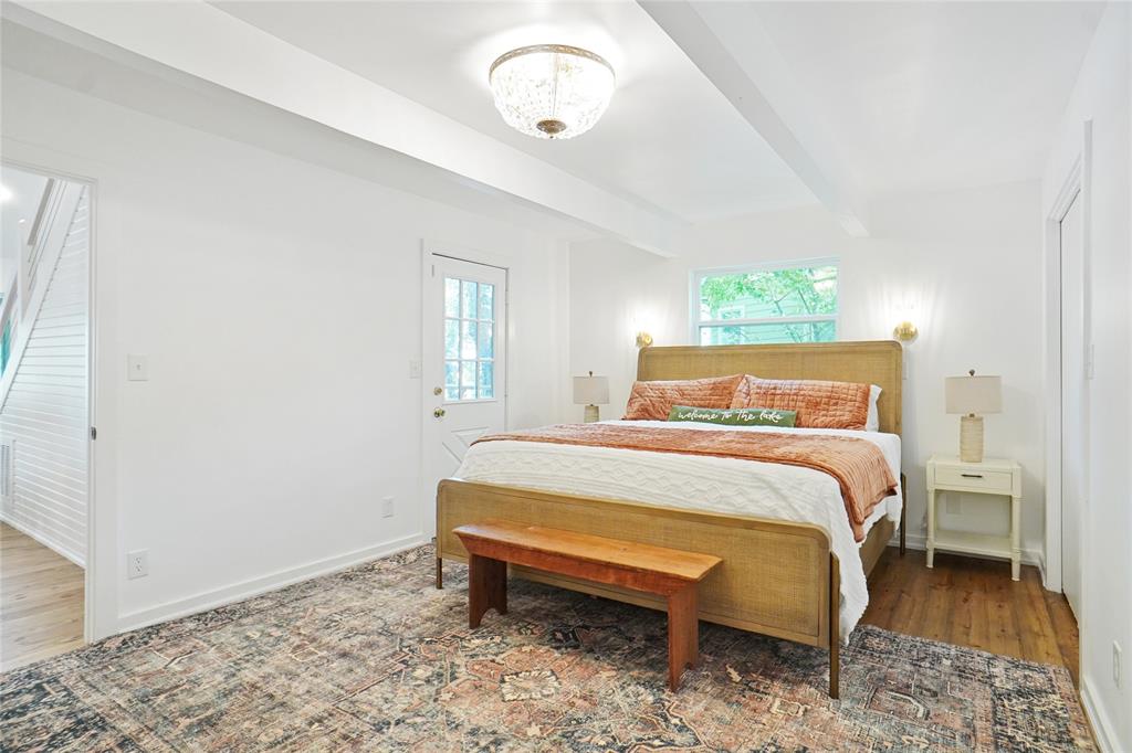 2147 Chaparral Gainesville, TX 76240 - Photo 20 of 40 a bedroom with a bed and a window