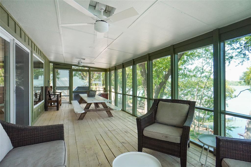 2147 Chaparral Gainesville, TX 76240 - Photo 31 of 40 a balcony with furniture and a ceiling fan