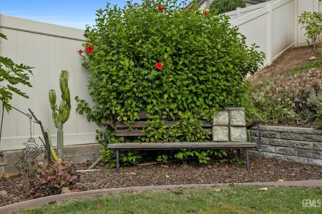 a view of a bench in the garden