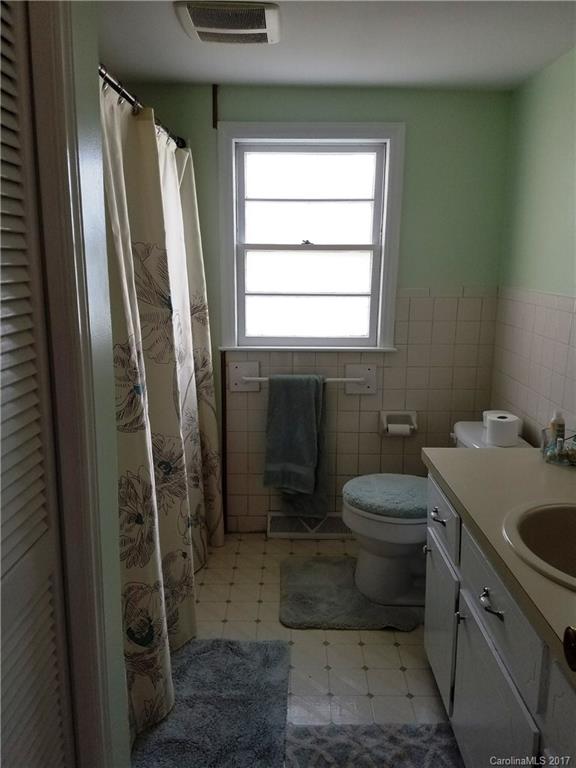 553 Cat Square Road Lincolnton, NC 28092 - Photo 15 of 24 a bathroom with a granite countertop sink toilet and shower