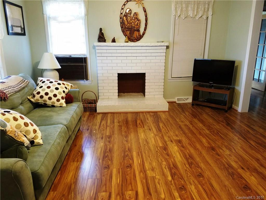 553 Cat Square Road Lincolnton, NC 28092 - Photo 7 of 24 a living room with furniture and a fireplace