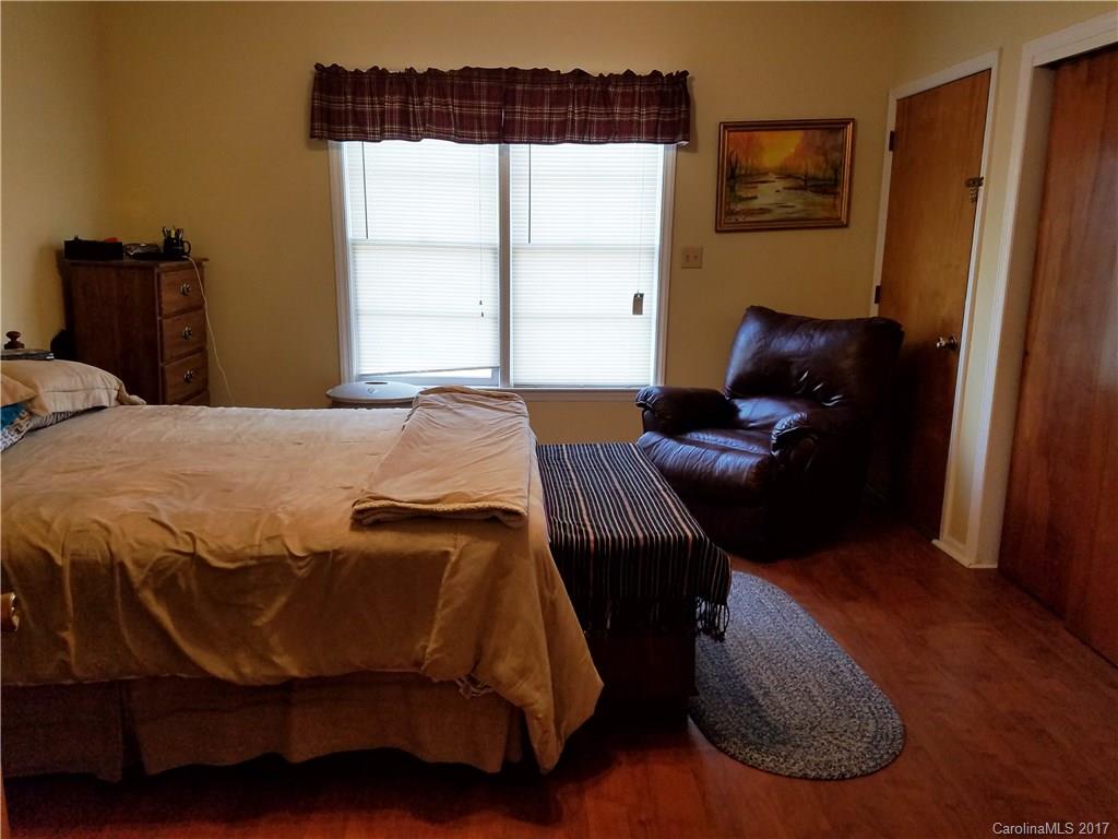 553 Cat Square Road Lincolnton, NC 28092 - Photo 10 of 24 a bedroom with a bed and wooden floor