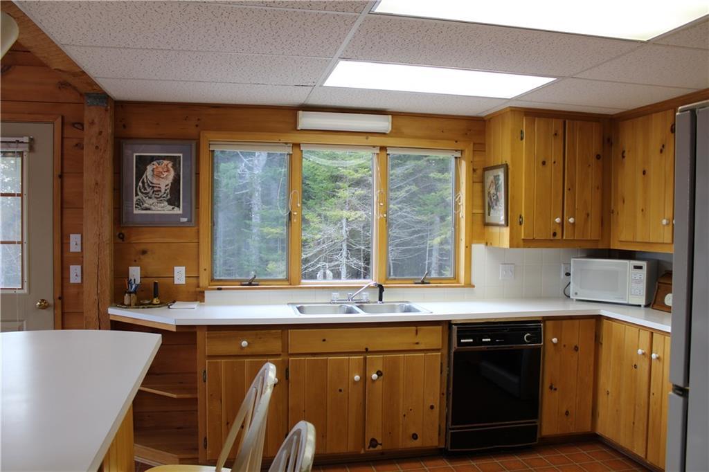 484 Duck Cove Road Roque Bluffs, ME 04654 - Photo 12 of 34 Great cabinet space and a nice view...