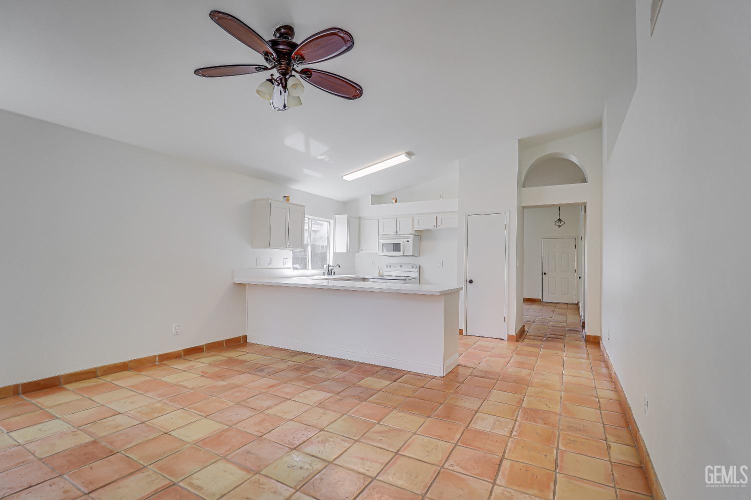 Undisclosed Address Bakersfield, CA 93312 - Photo 12 of 24 a view of a kitchen with marble kitchen and sink