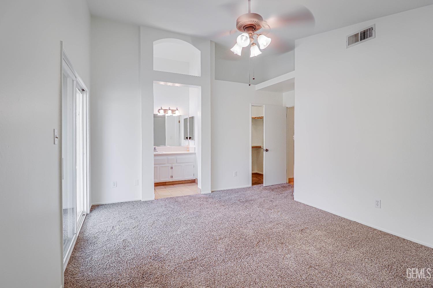 Undisclosed Address Bakersfield, CA 93312 - Photo 18 of 24 a view of a chandelier in big room and a bathroom