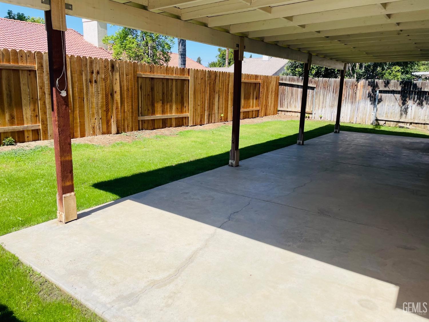 Undisclosed Address Bakersfield, CA 93312 - Photo 22 of 24 a view of a backyard with porch