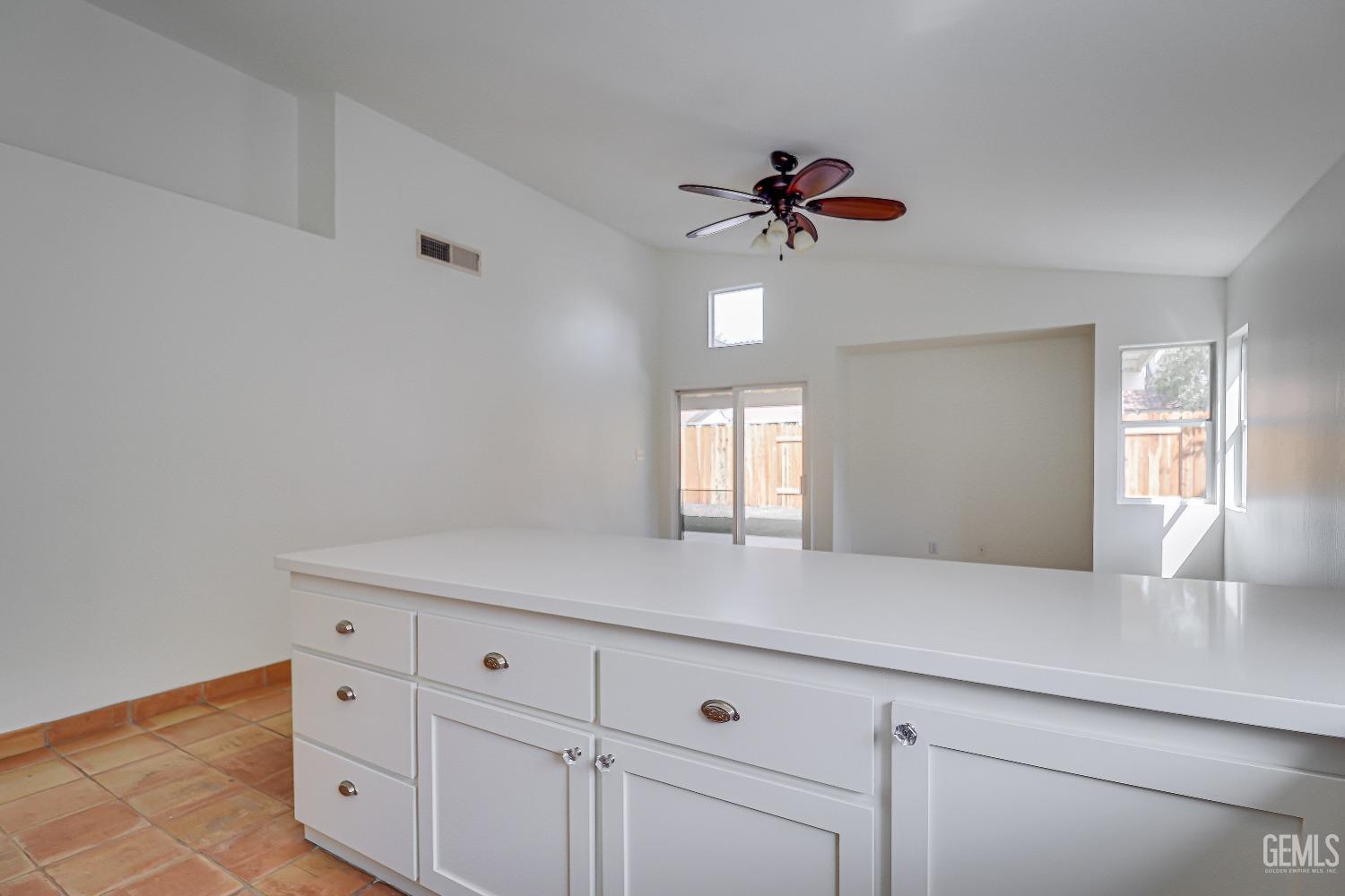 Undisclosed Address Bakersfield, CA 93312 - Photo 8 of 24 a living room with hard wood floors
