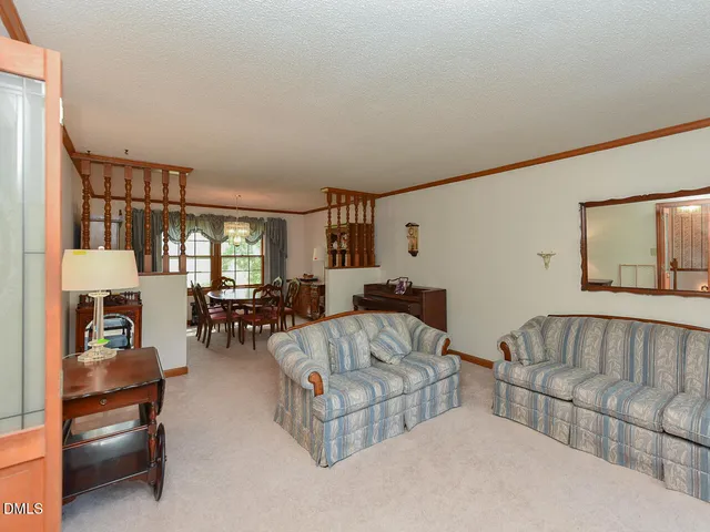 a living room with furniture and a couch