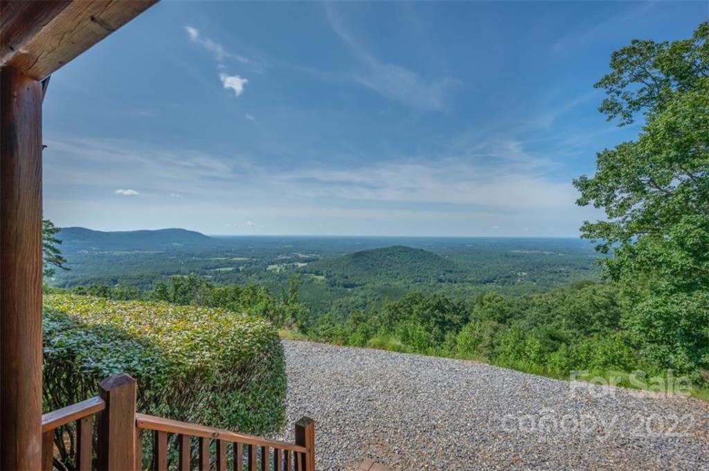175 Big Rock Road Bostic, NC 28018 - Photo 14 of 45 a view of a green field with mountains in the background