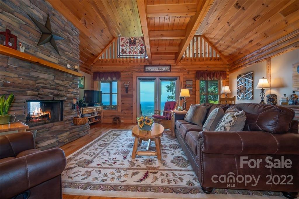 175 Big Rock Road Bostic, NC 28018 - Photo 17 of 45 a living room with furniture and a fireplace