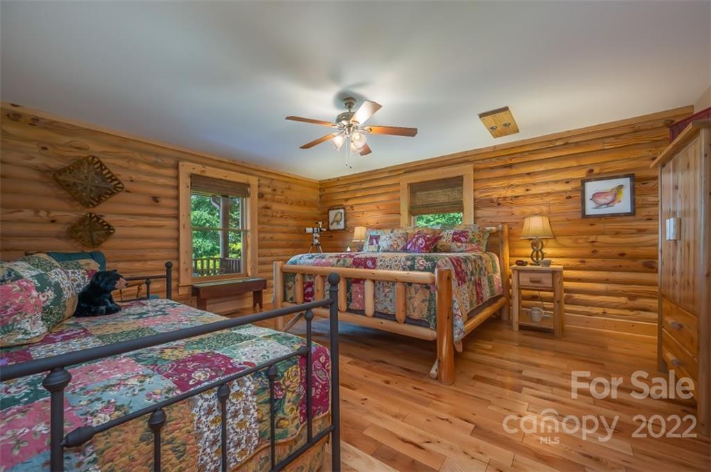 175 Big Rock Road Bostic, NC 28018 - Photo 31 of 45 a bedroom with furniture and wooden floor