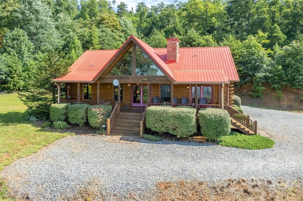 175 Big Rock Road Bostic, NC 28018 - Photo 5 of 45 a front view of a house with garden
