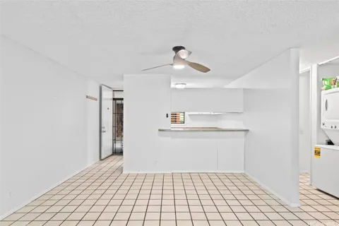 a bathroom with a sink a mirror and cabinets