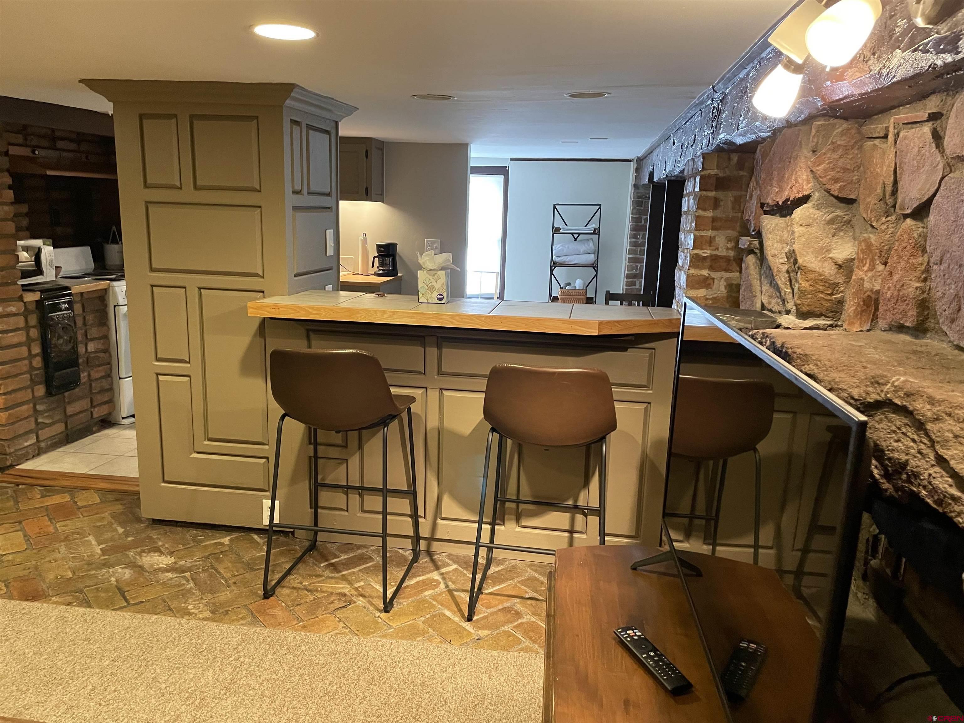 232 Main Street Ouray, CO 81427 - Photo 16 of 21 Breakfast Nook in lower-level rustic historic apartment