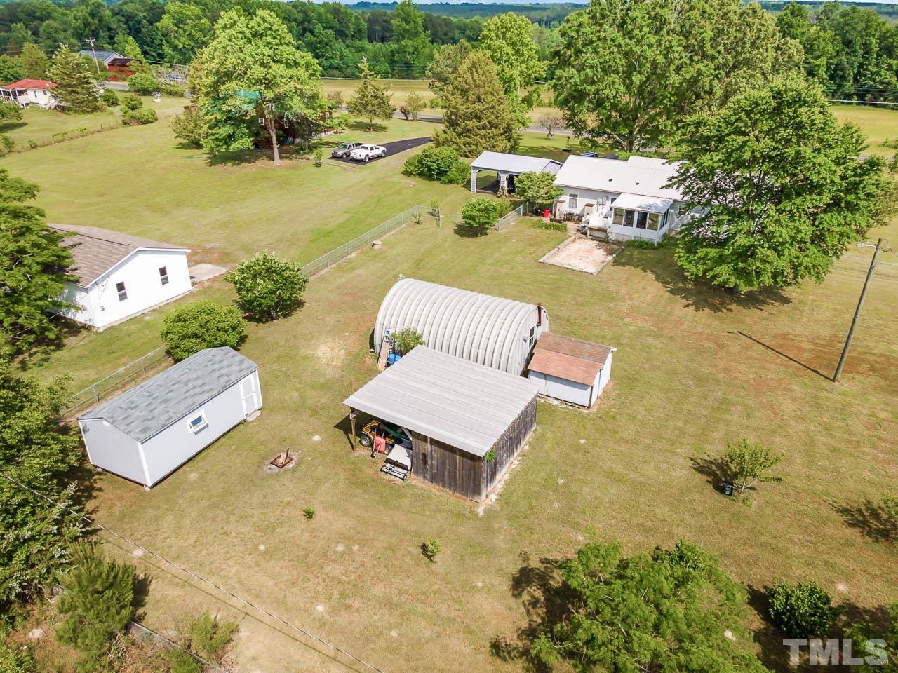 3255 Walters Road Creedmoor, NC 27522 - Photo 17 of 19 an aerial view of a house with yard swimming pool and outdoor seating