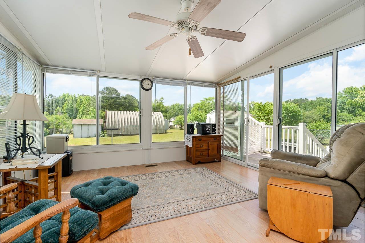 3255 Walters Road Creedmoor, NC 27522 - Photo 8 of 19 a living room with furniture and a large window