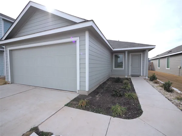 a view of a house with garage