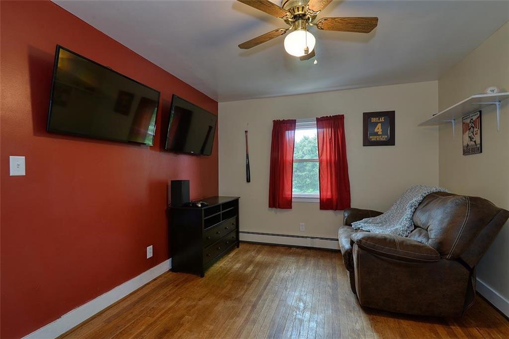 680 Dry Ridge Road West Alexander, PA 15376 - Photo 11 of 19 a living room with furniture and a flat screen tv