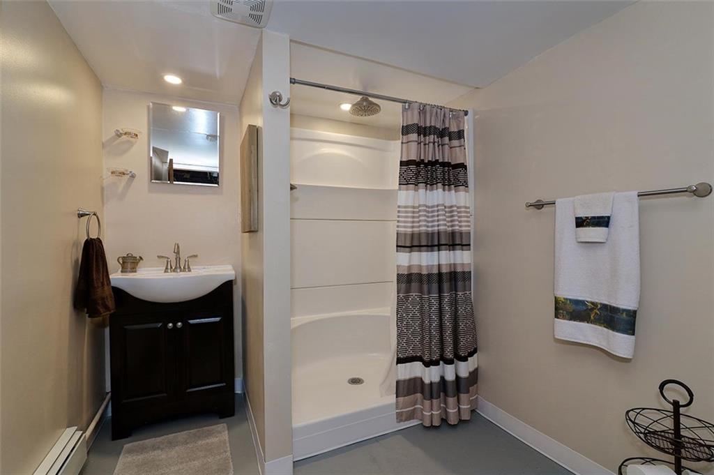 680 Dry Ridge Road West Alexander, PA 15376 - Photo 15 of 19 a bathroom with a sink double vanity and a mirror