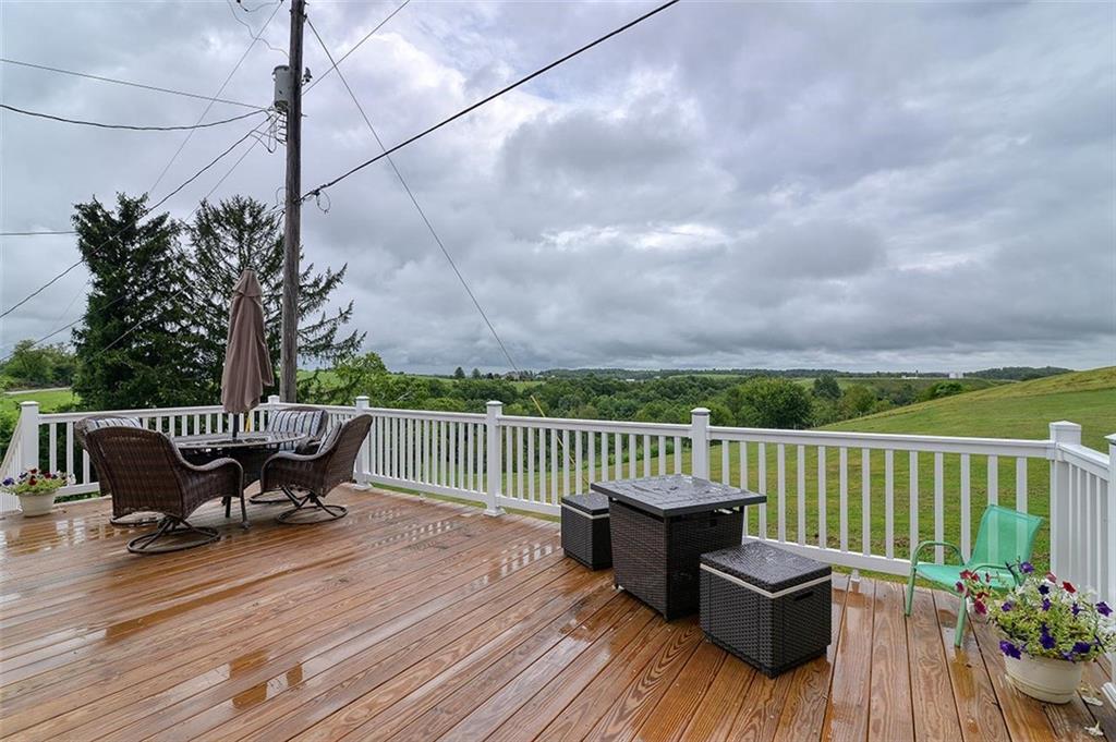 680 Dry Ridge Road West Alexander, PA 15376 - Photo 17 of 19 a view of a chair and table on the wooden floor