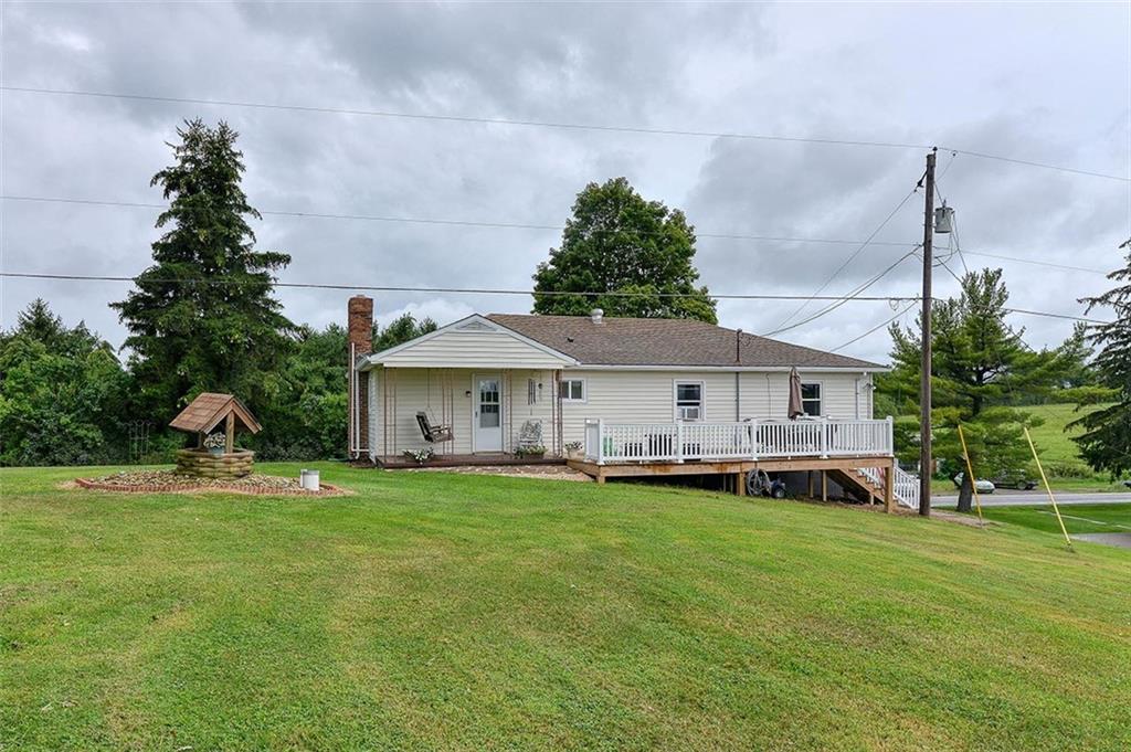 680 Dry Ridge Road West Alexander, PA 15376 - Photo 19 of 19 a view of a house with a big yard and potted plants