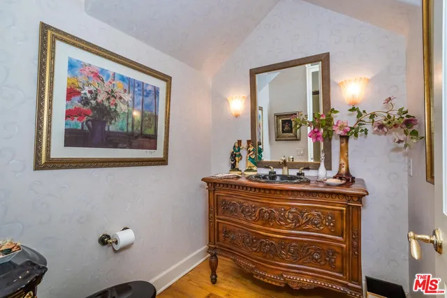 a view of hall way with furniture