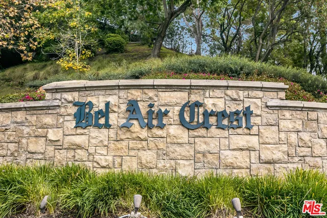 a view of outdoor space with garden and trees