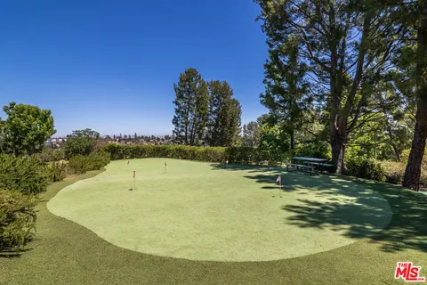 a garden view with a seating space
