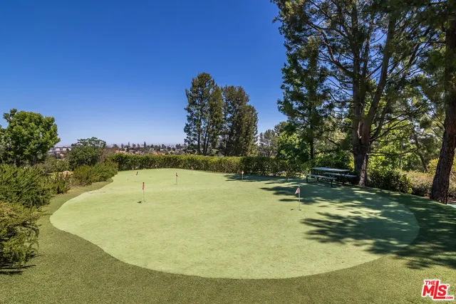 a garden view with a seating space