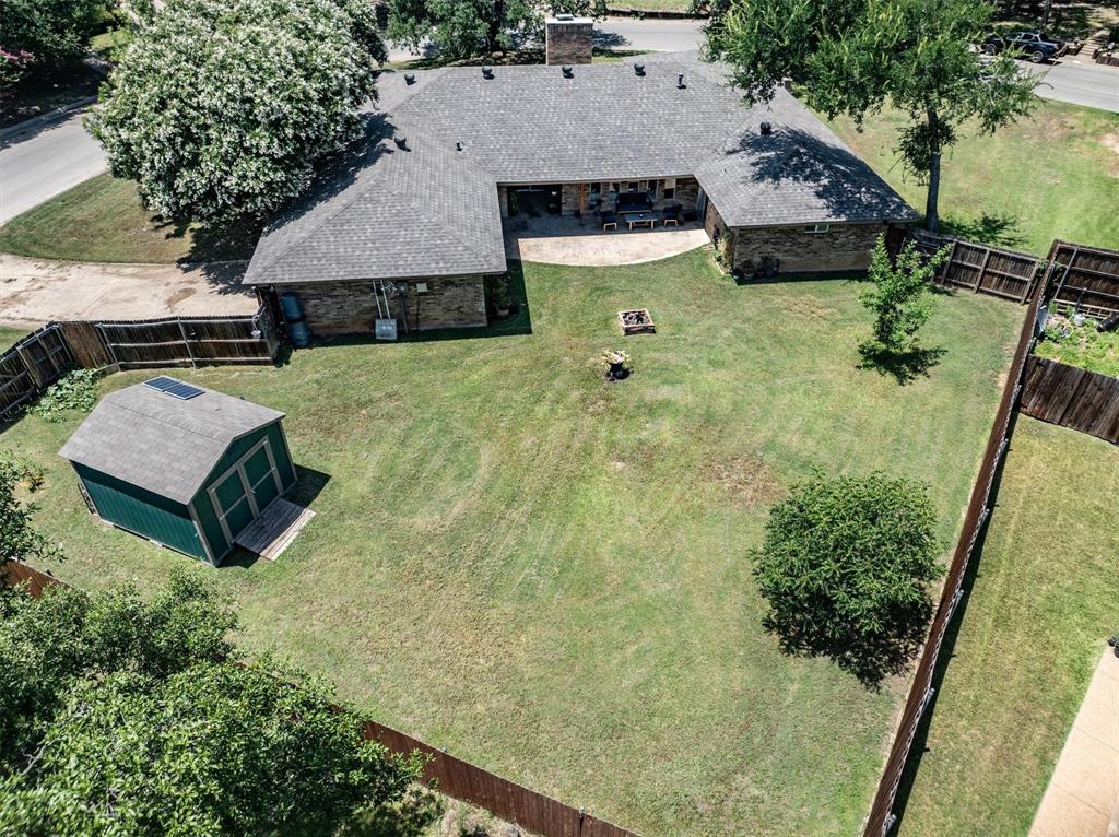 2016 Pembrooke Place Denton, TX 76205 - Photo 32 of 40 an aerial view of a house with swimming pool and patio
