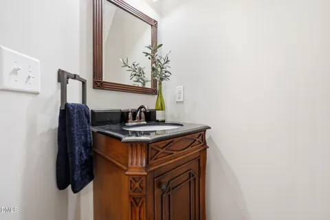 a view of storage and utility room with a sink