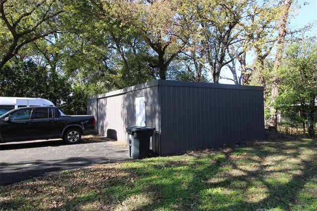 a car parked in front of a house