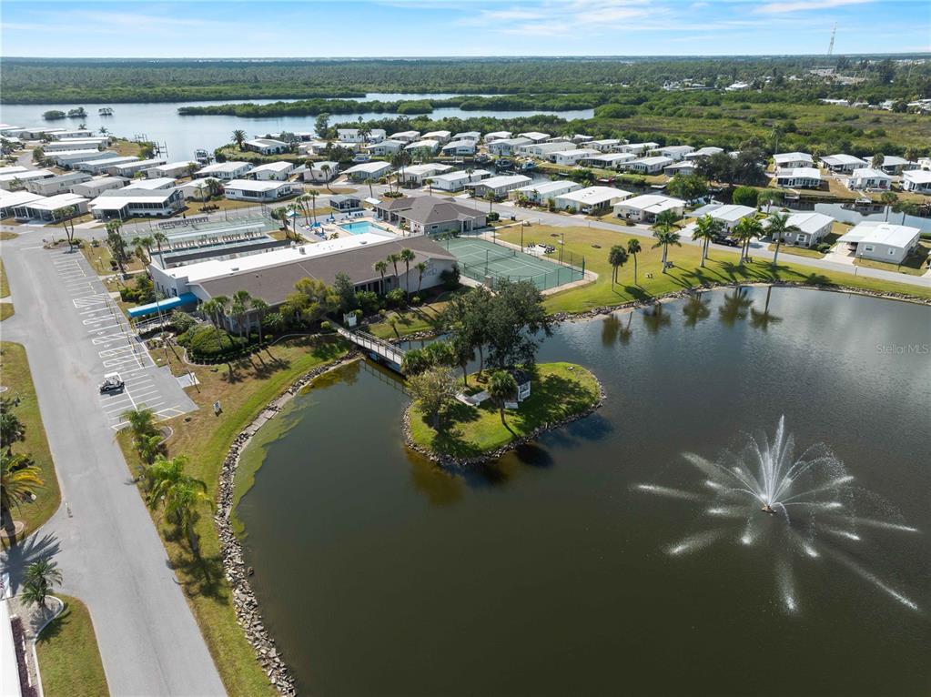 154 Rarotonga Road North Port, FL 34287 - Photo 35 of 47 a view of a lake with a city
