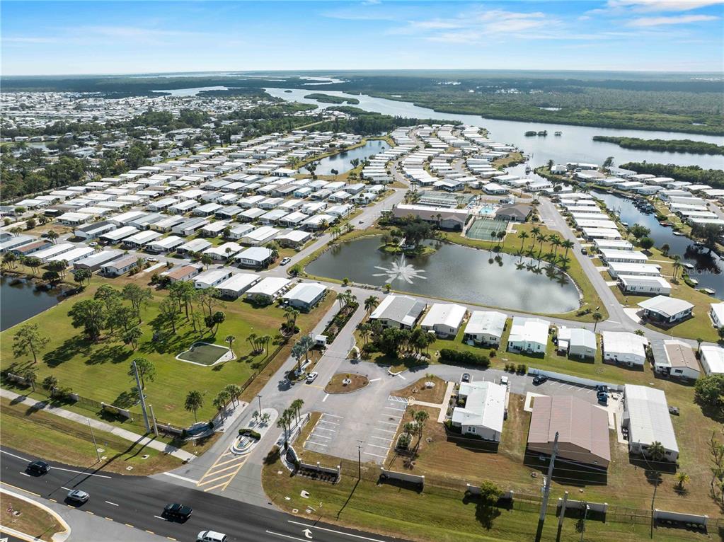 154 Rarotonga Road North Port, FL 34287 - Photo 38 of 47 an aerial view of residential houses with outdoor space