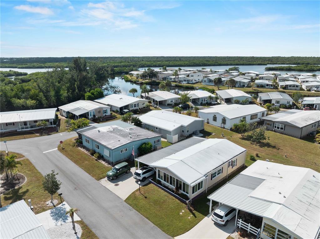 154 Rarotonga Road North Port, FL 34287 - Photo 43 of 47 an aerial view of a residential houses with city view
